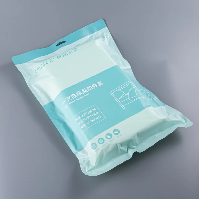 4Pcs-Disposable-Bed-Sheet-Set-Hotel-Hospitality-Bedding-Non-Woven-Custom-Logo-Bulk-Supply-Duvet-Cover-Pillowcases