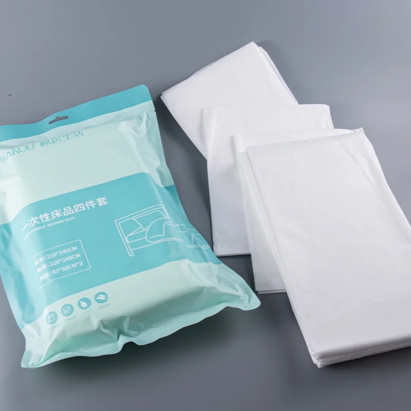 Custom-Logo-Bulk-Supply-Disposable-Bed-Sheet-Set-4Pcs-Hotel-Hospitality-Bedding-Non-Woven-Duvet-Cover-Pillowcases