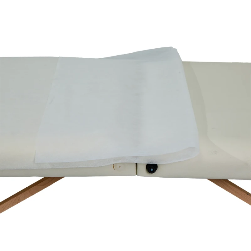 Disposable-Bed-Sheet-Rolls-Are-Made-of-35gsm-High-quality-Spunbond-Non-woven-Fabric-Laminated-with-Waterproof-PE-Film
