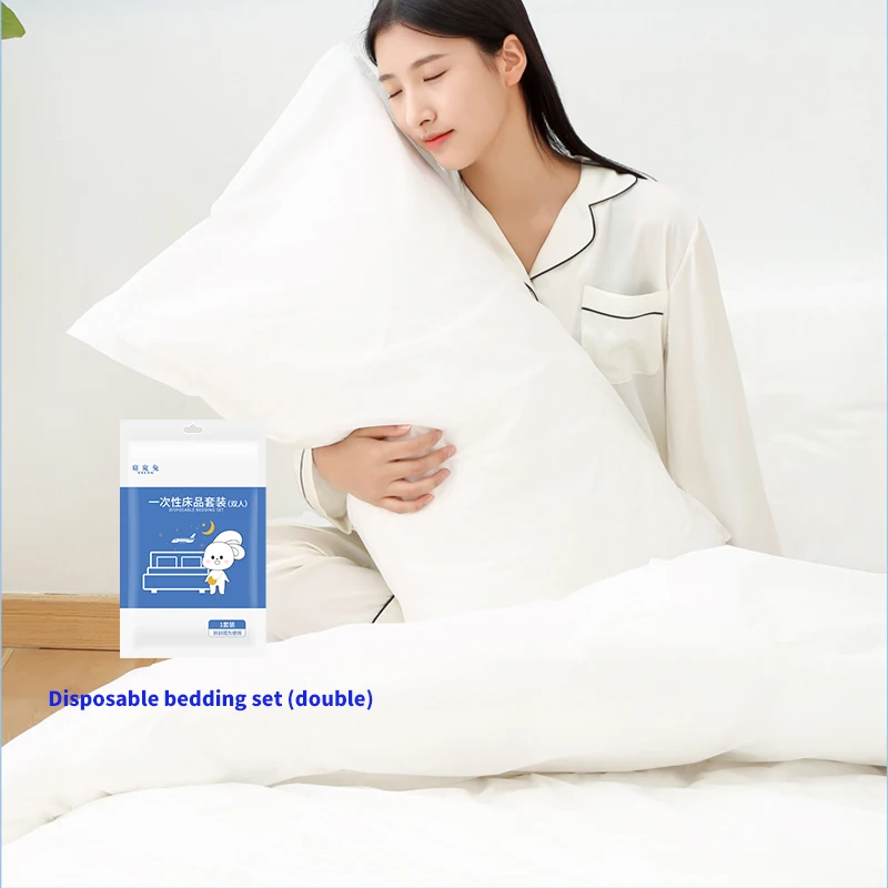 Disposable-Double-Quilt-Cover-Pillowcase-Set-4-Piece-Custom-Non-Woven-Hotel-Travel-Bedding