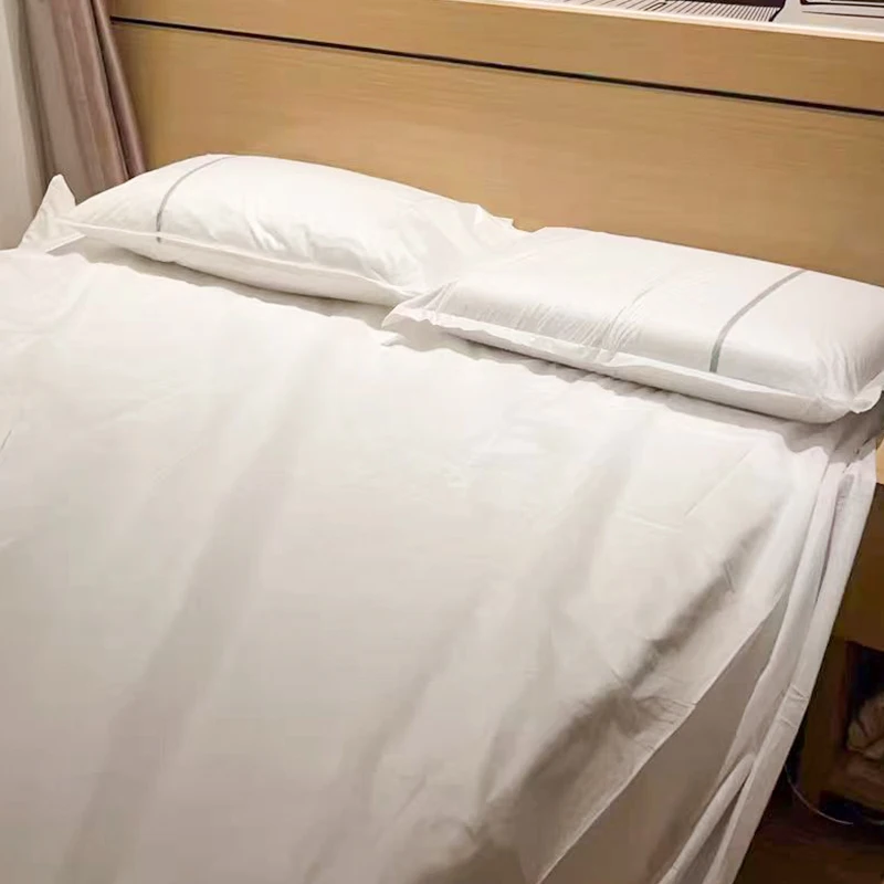 Nonwoven-Bed-Sheet-Set-Suppliers-Quilt-Cover-Pillowcase-Hotel-Luxury-Double-Travel-Disposable-Bedding-Four-Piece-Set